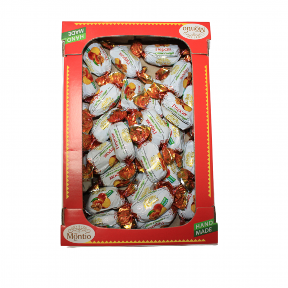 Цукерки Montio персик з горіхом в глазури